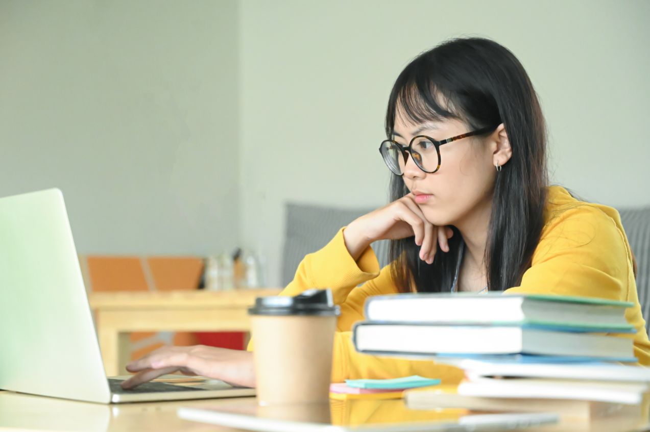 Teenage Girl having Economics Tuition