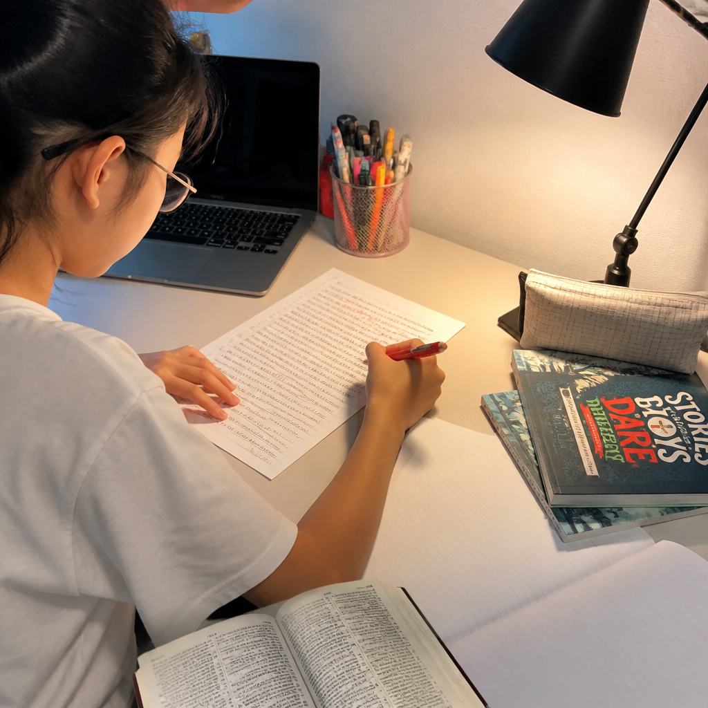 A Primary 6 student revising an English composition draft for PSLE grammar and clarity.