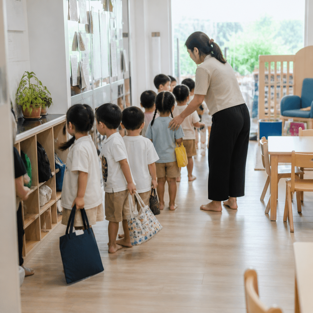 Singapore preschool classroom routine showing children lining up and tidying up independently.
